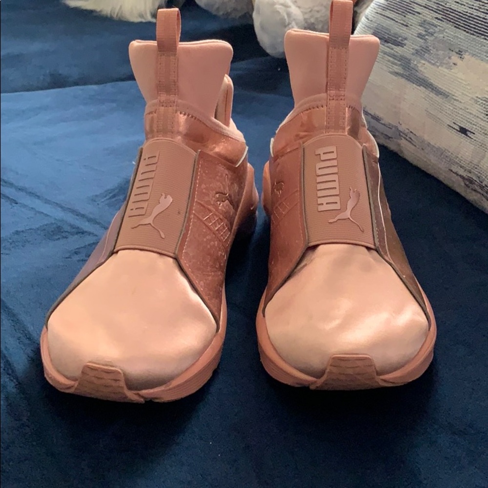 PUMA sneakers.